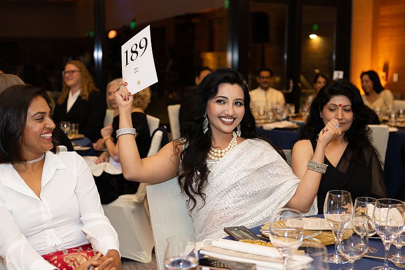 auction corporate photoshoot of business meeting speech for great leaders captured by cultureclicks