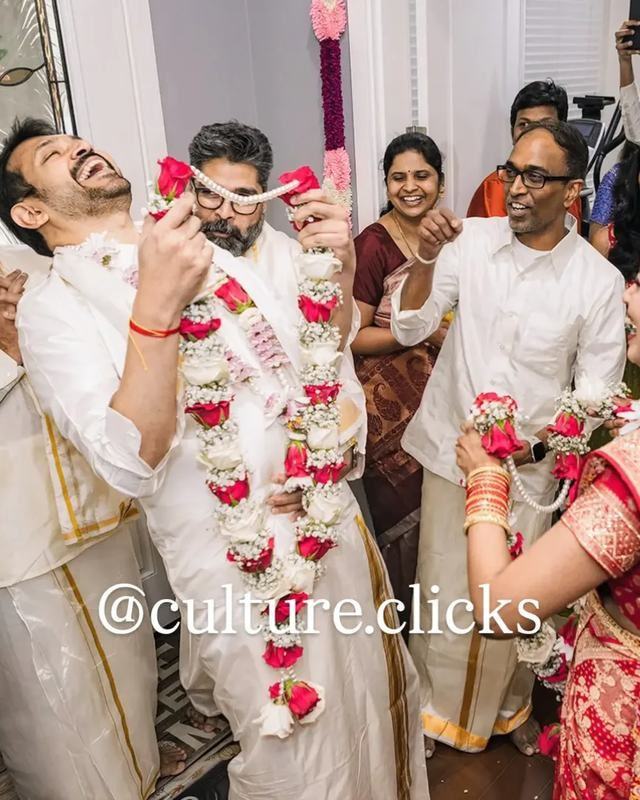 Bride and groom exchanging garlands during a Tamil Maalai Maatral
